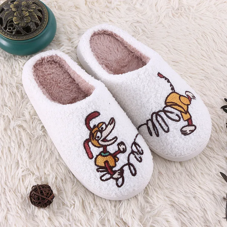 White plush non-slip slippers with artificial wool lining and rubber sole.