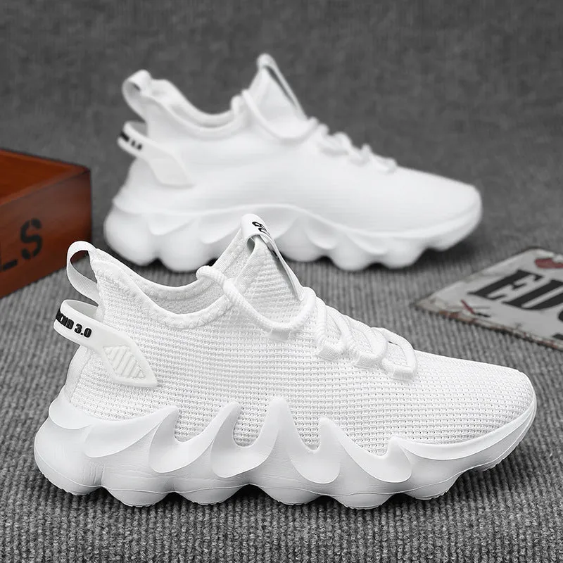 Men's low-top sock-like sports shoes in grey with a round toe, flat heel, and lace-up front.