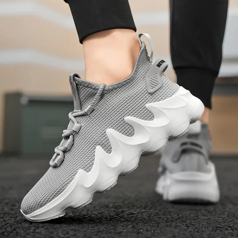 Men's low-top sock-like sports shoes in grey with a round toe, flat heel, and lace-up front.