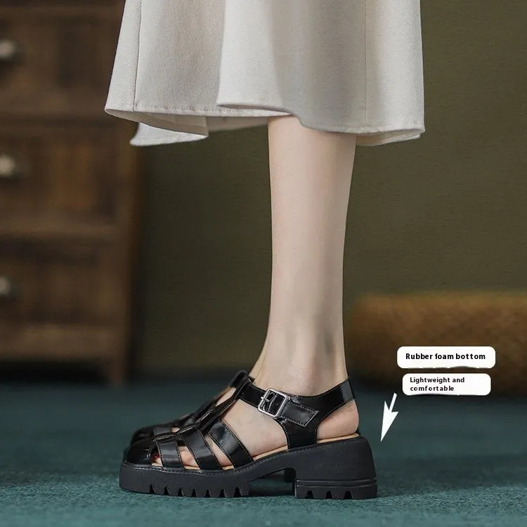 Women's black retro platform sandals with chunky heel, round toe, and adjustable buckle strap.