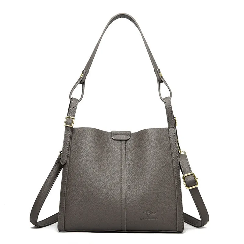 Brown PU women's shoulder bag with single strap and multiple interior compartments