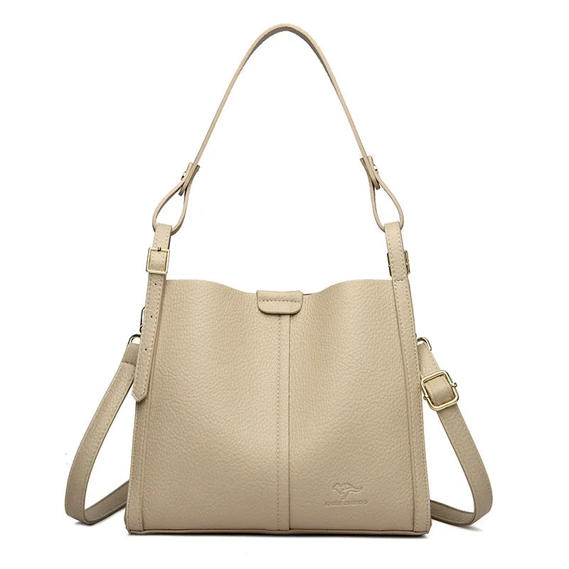 Brown PU women's shoulder bag with single strap and multiple interior compartments