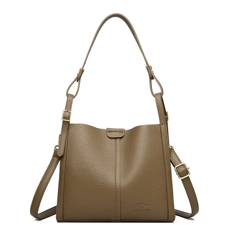 Brown PU women's shoulder bag with single strap and multiple interior compartments