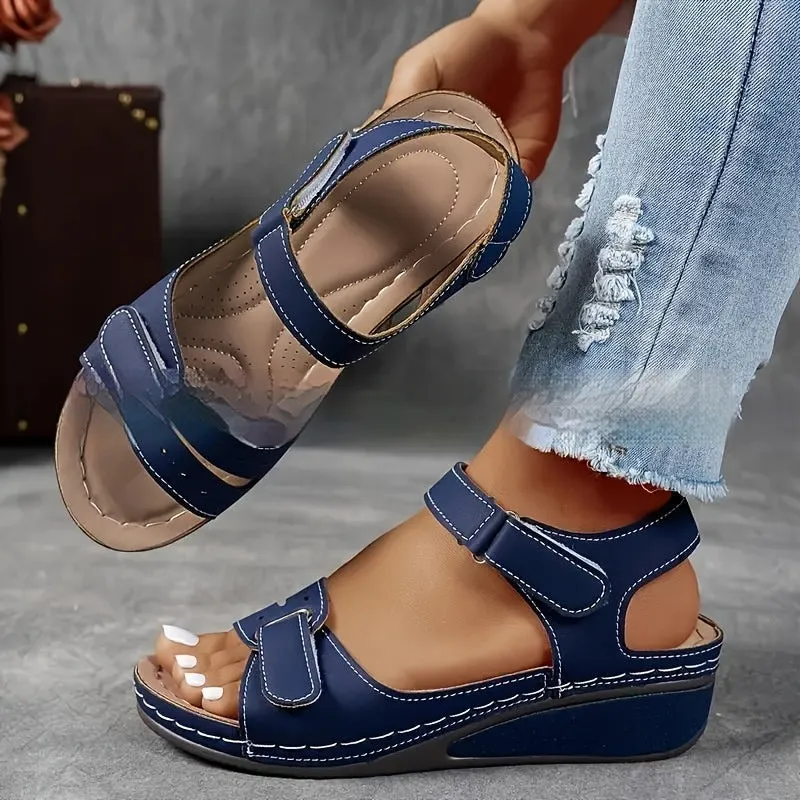Beige plus size strap sandals with a thick composite sole and Velcro closure on a white background.