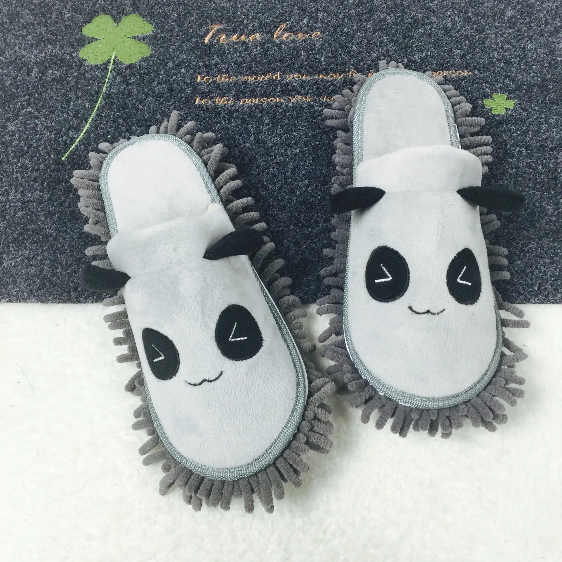 Panda-themed removable slippers in coral fleece with chenille sole