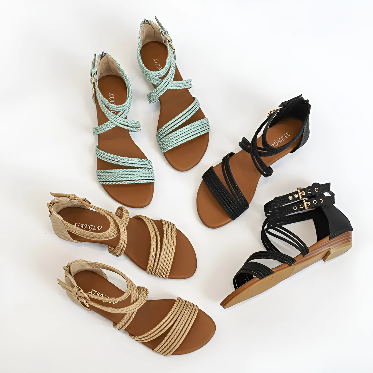 Women's open-toe Roman sandals with cross-strap design and thick rubber sole in light green colour