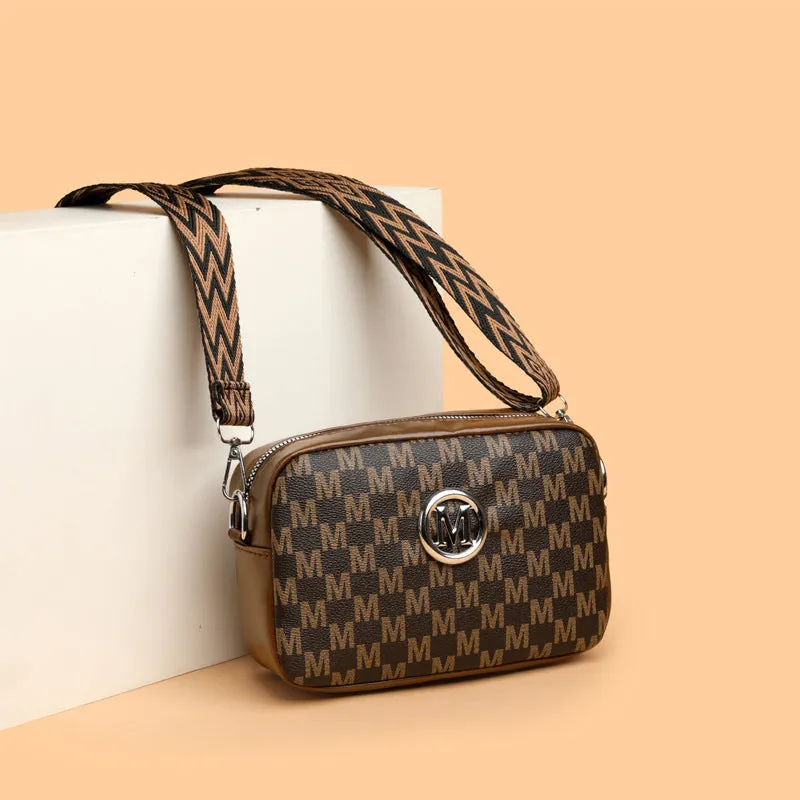 Wide-strap shoulder crossbody bag in PU material with three-dimensional pockets