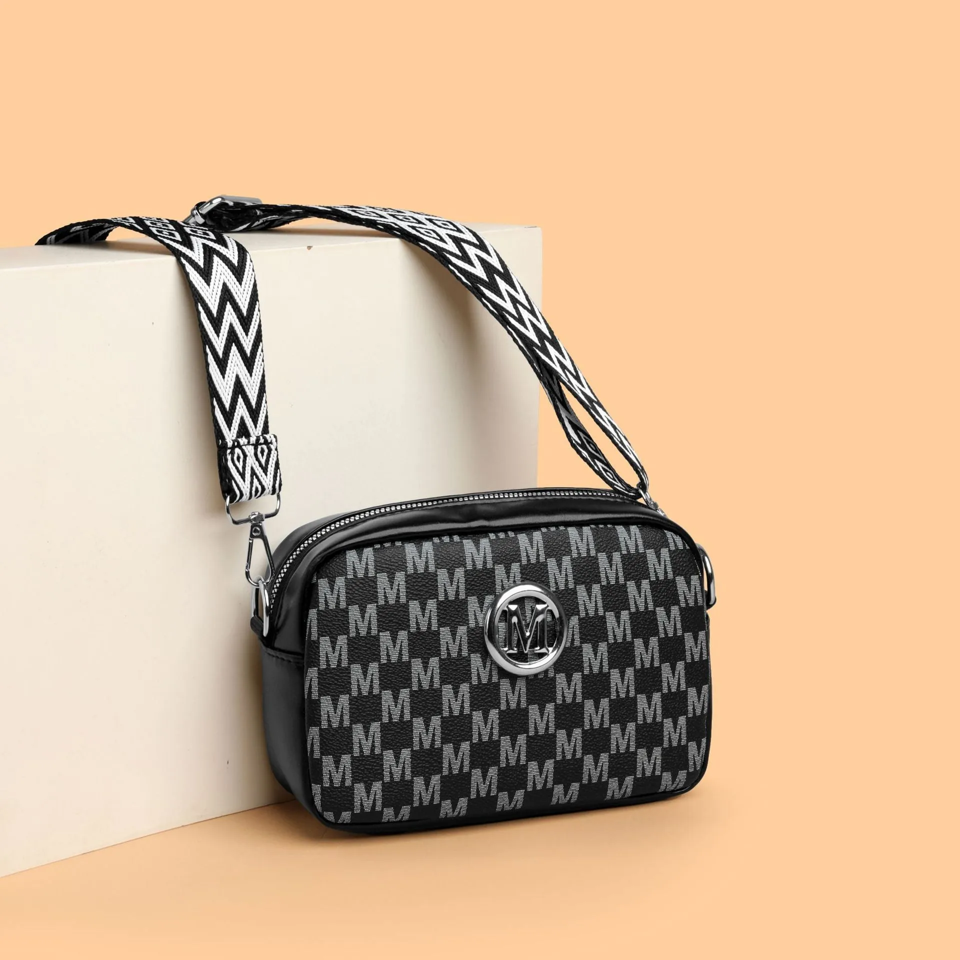 Wide-strap shoulder crossbody bag in PU material with three-dimensional pockets