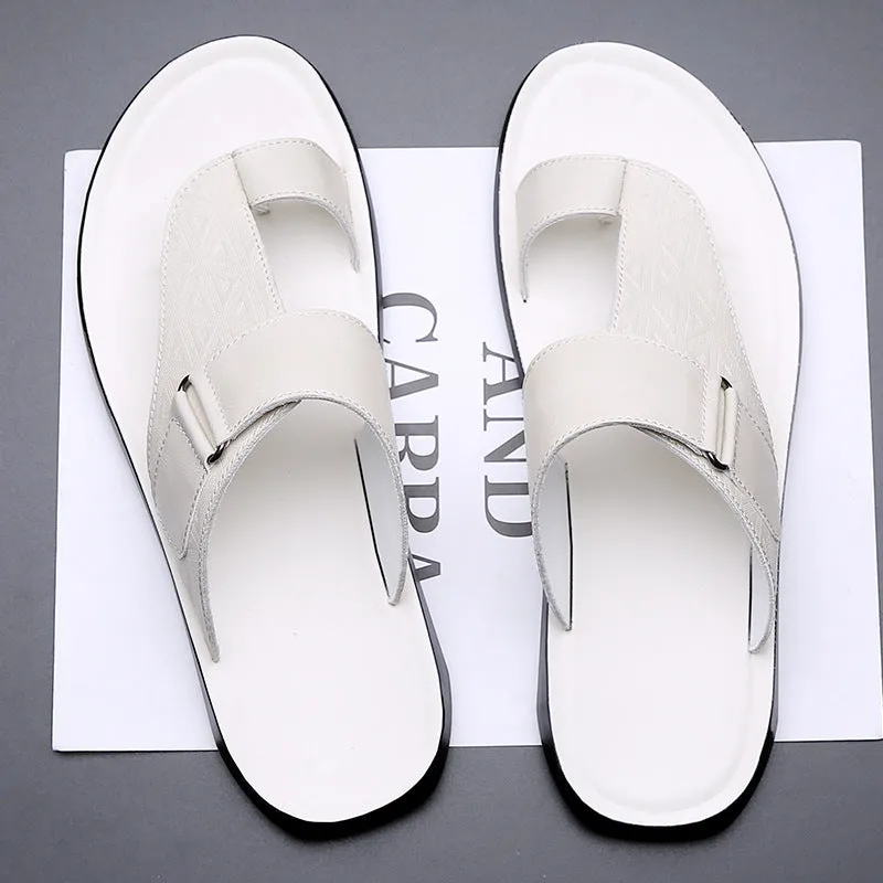 Men's white open-toe cowhide leather slippers with a rubber sole on a casual background