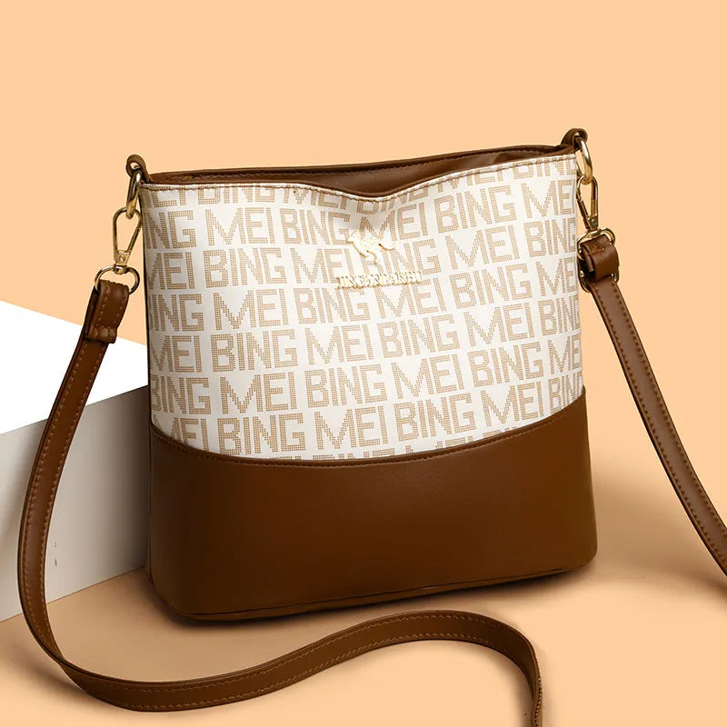 Brown soft leather retro messenger bag with external pockets and internal organisation compartments