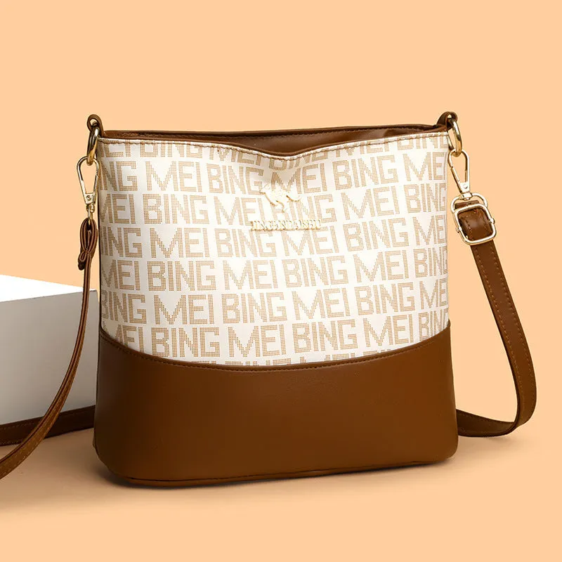 Brown soft leather retro messenger bag with external pockets and internal organisation compartments