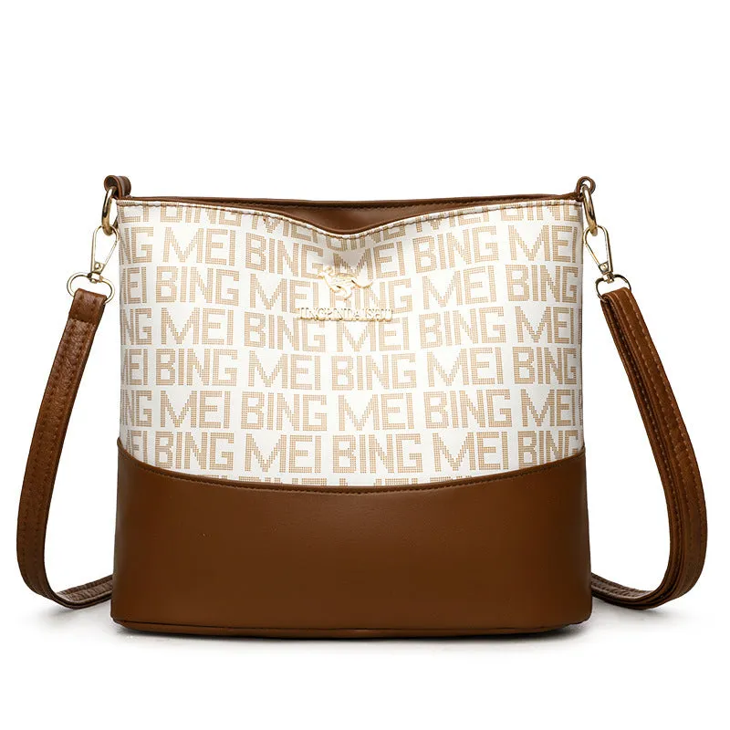 Brown soft leather retro messenger bag with external pockets and internal organisation compartments