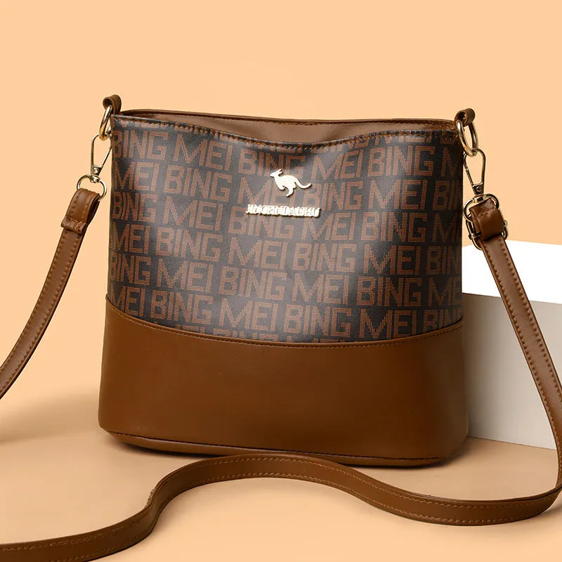 Brown soft leather retro messenger bag with external pockets and internal organisation compartments