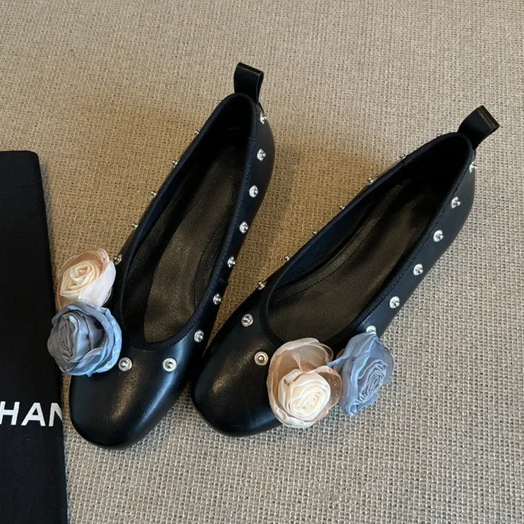 Silver Mary Jane buckle flats with DIY flower rivets on the strap, showing round toe and low top profile.
