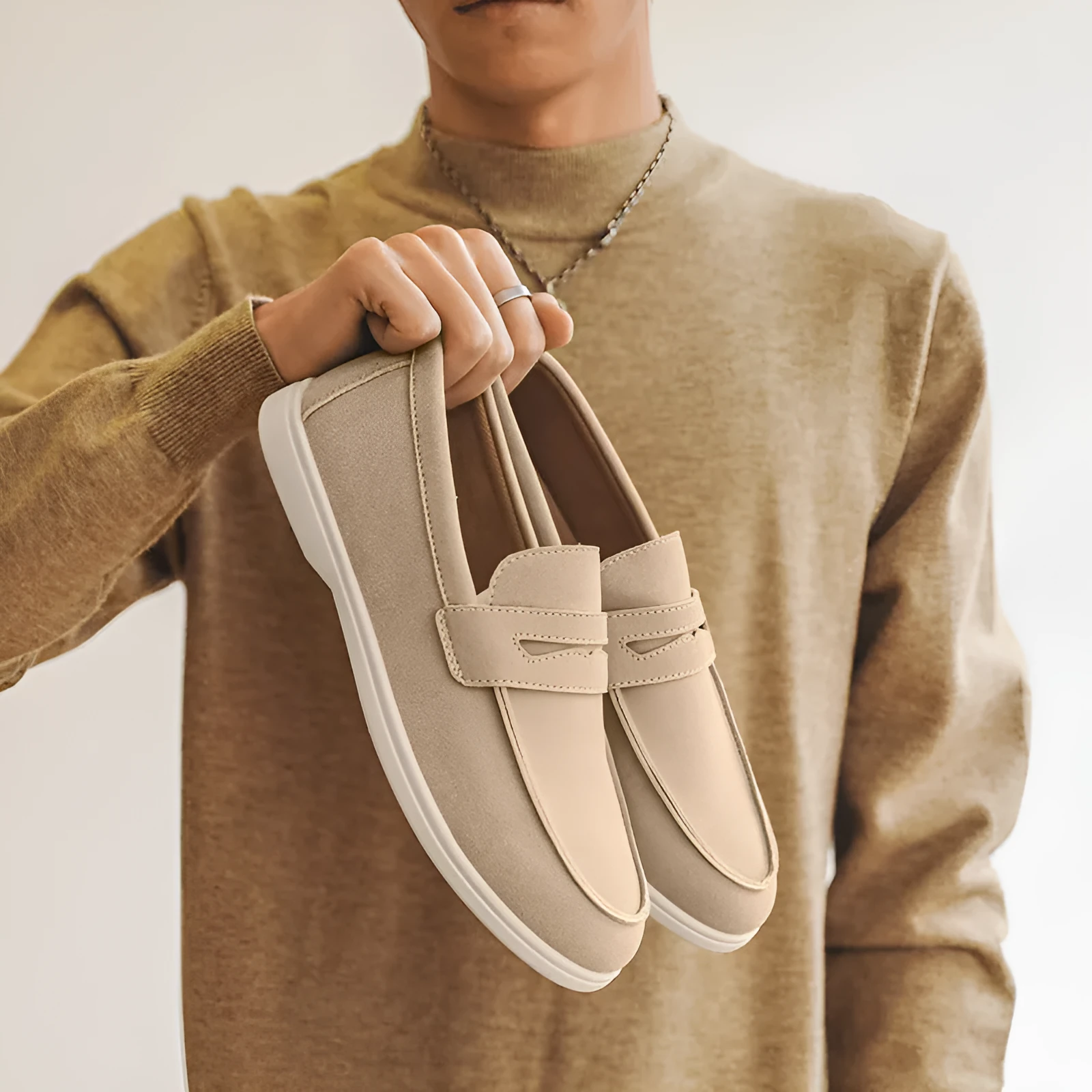 Men's suede leather slip-on casual shoe in a solid colour with a round toe and low flat heel.
