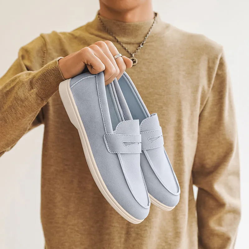 Men's suede leather slip-on casual shoe in a solid colour with a round toe and low flat heel.