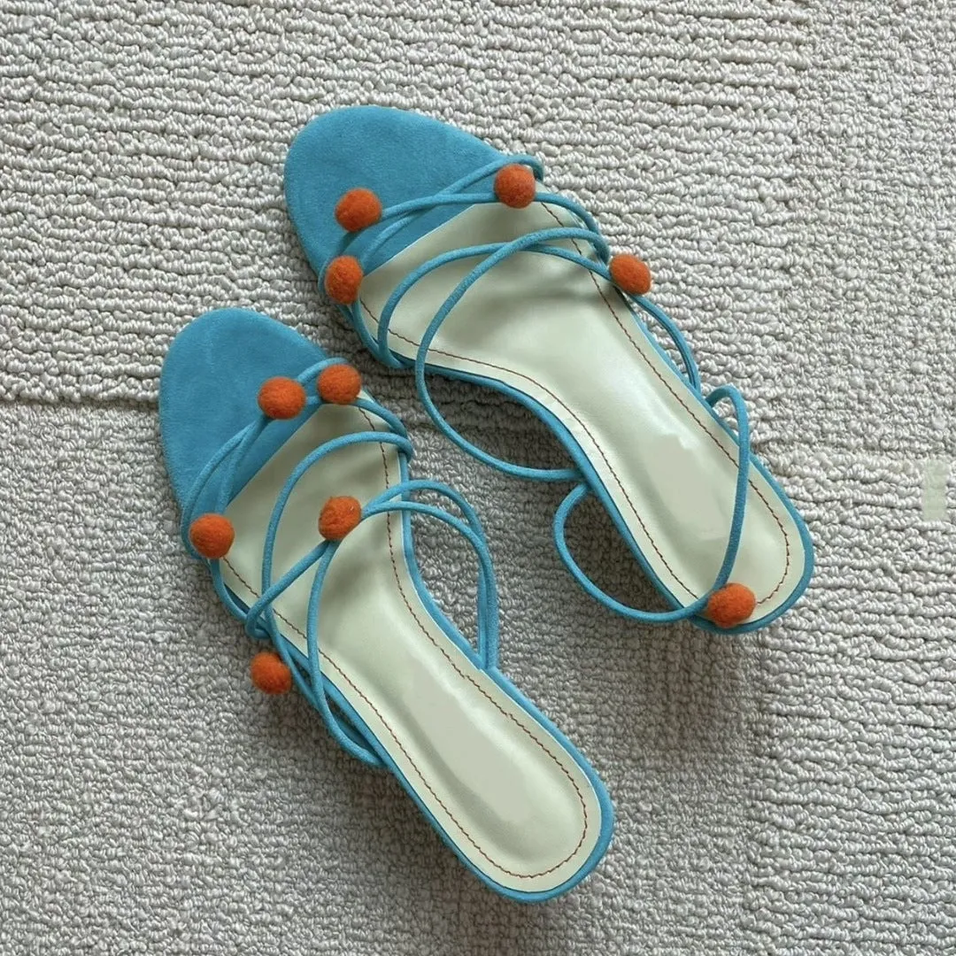 Cyan genuine leather women's sandals with lace-up straps, open toe, and a niche ball high heel.
