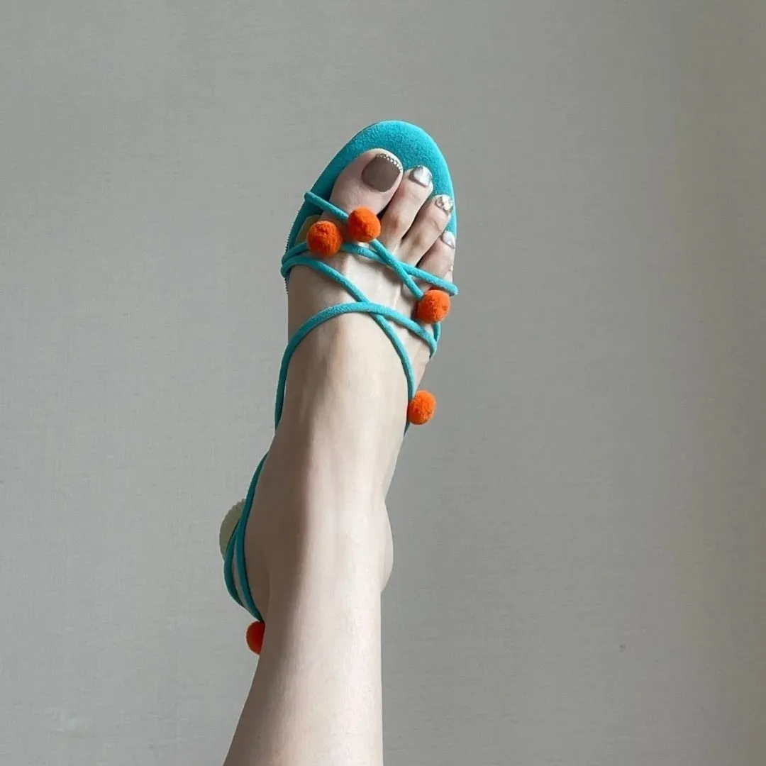 Cyan genuine leather women's sandals with lace-up straps, open toe, and a niche ball high heel.