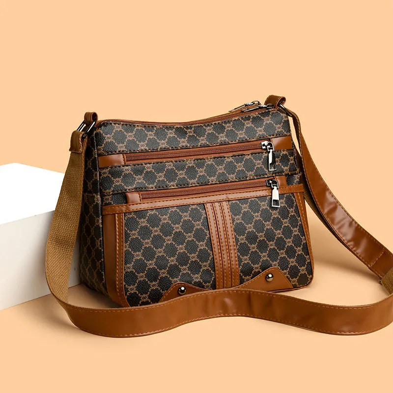 Women's brown and white stitching pattern large-capacity crossbody bag with PU exterior.