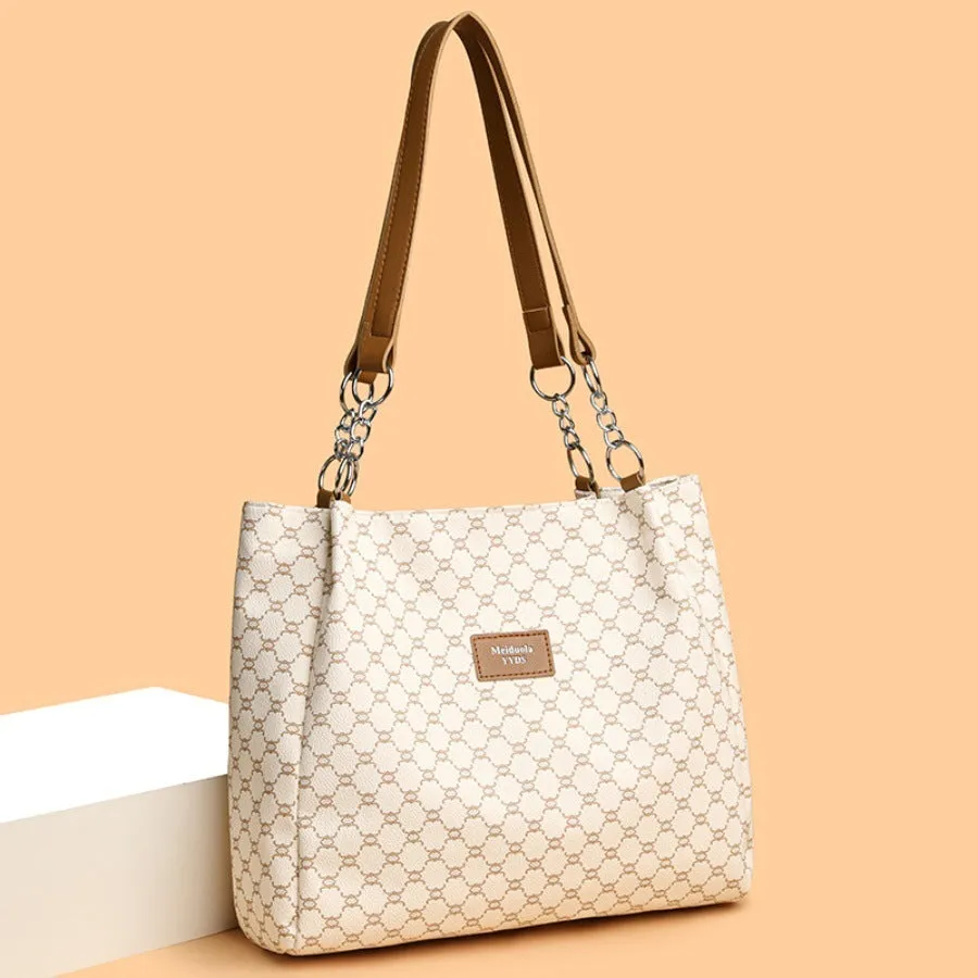 Retro women's handbag in soft brown PU leather with polyester lining.