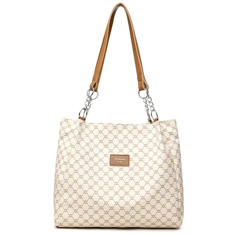 Retro women's handbag in soft brown PU leather with polyester lining.