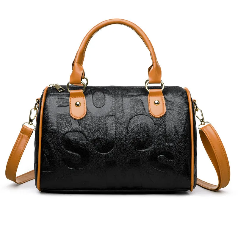 Brown cylindrical crossbody bag with leather-like texture and three shoulder straps