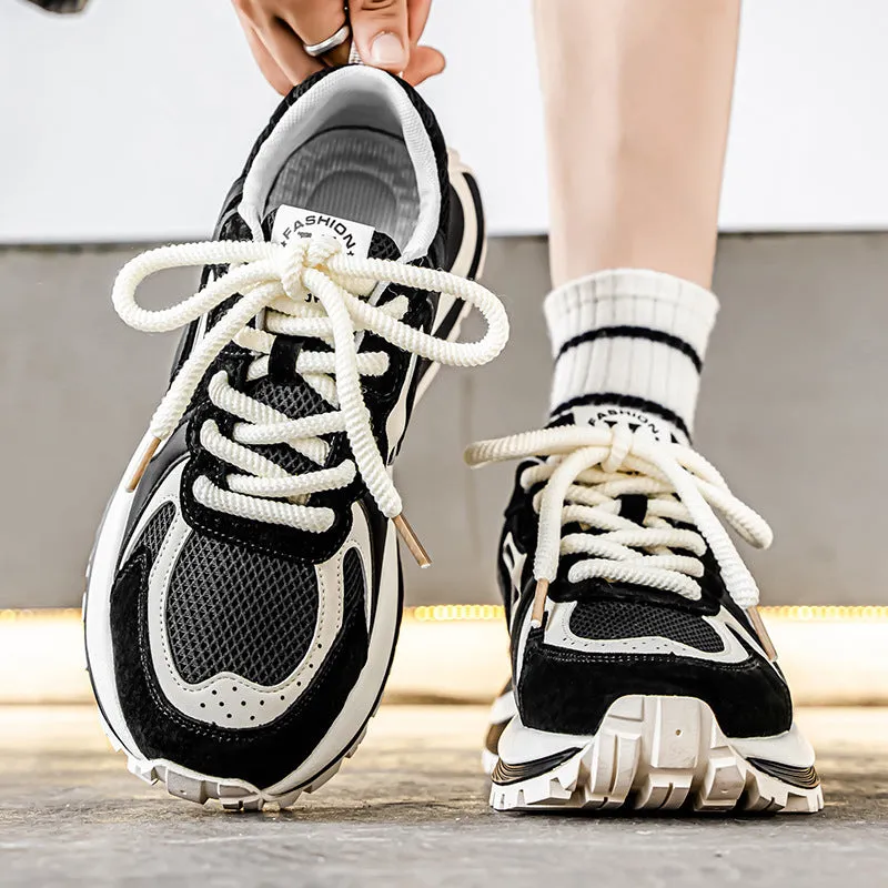Men's black mesh and synthetic leather lace-up casual sneaker with rubber sole.