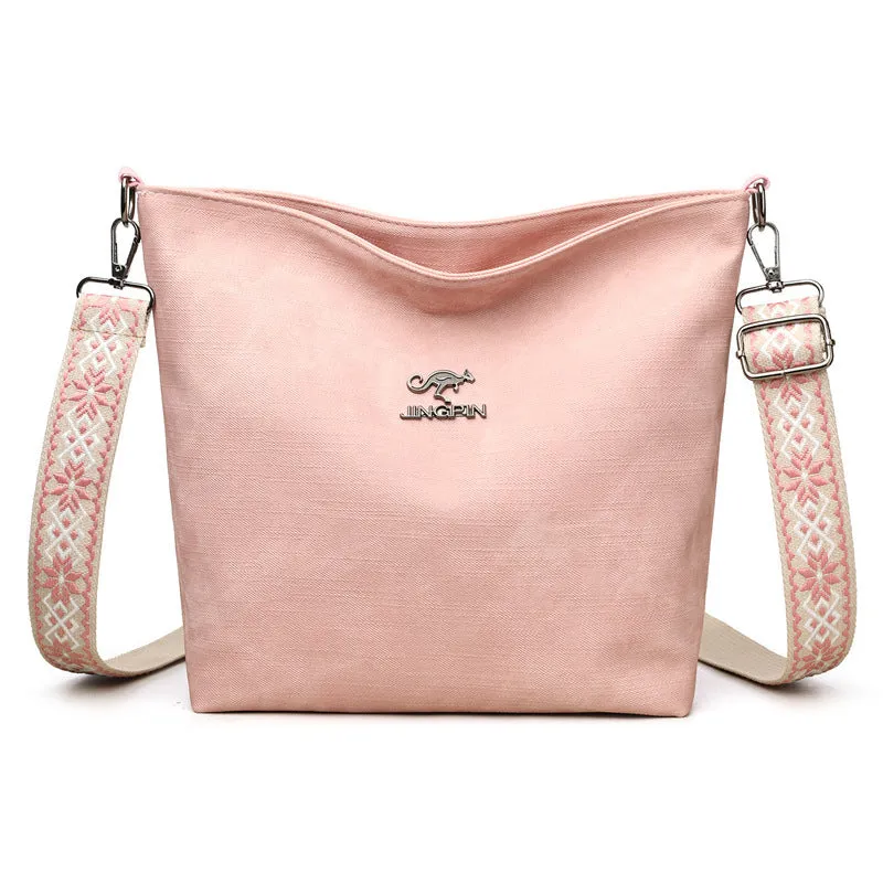 Soft PU crossbody bag in pink, grey or yellow with large capacity and adjustable shoulder strap