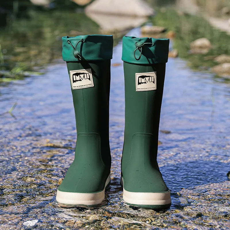 Solid colour high tube PVC rain boot in beige, shown on a white background.