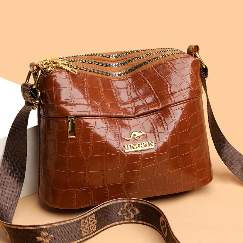 Brown PU messenger bag with multiple compartments and cross body strap
