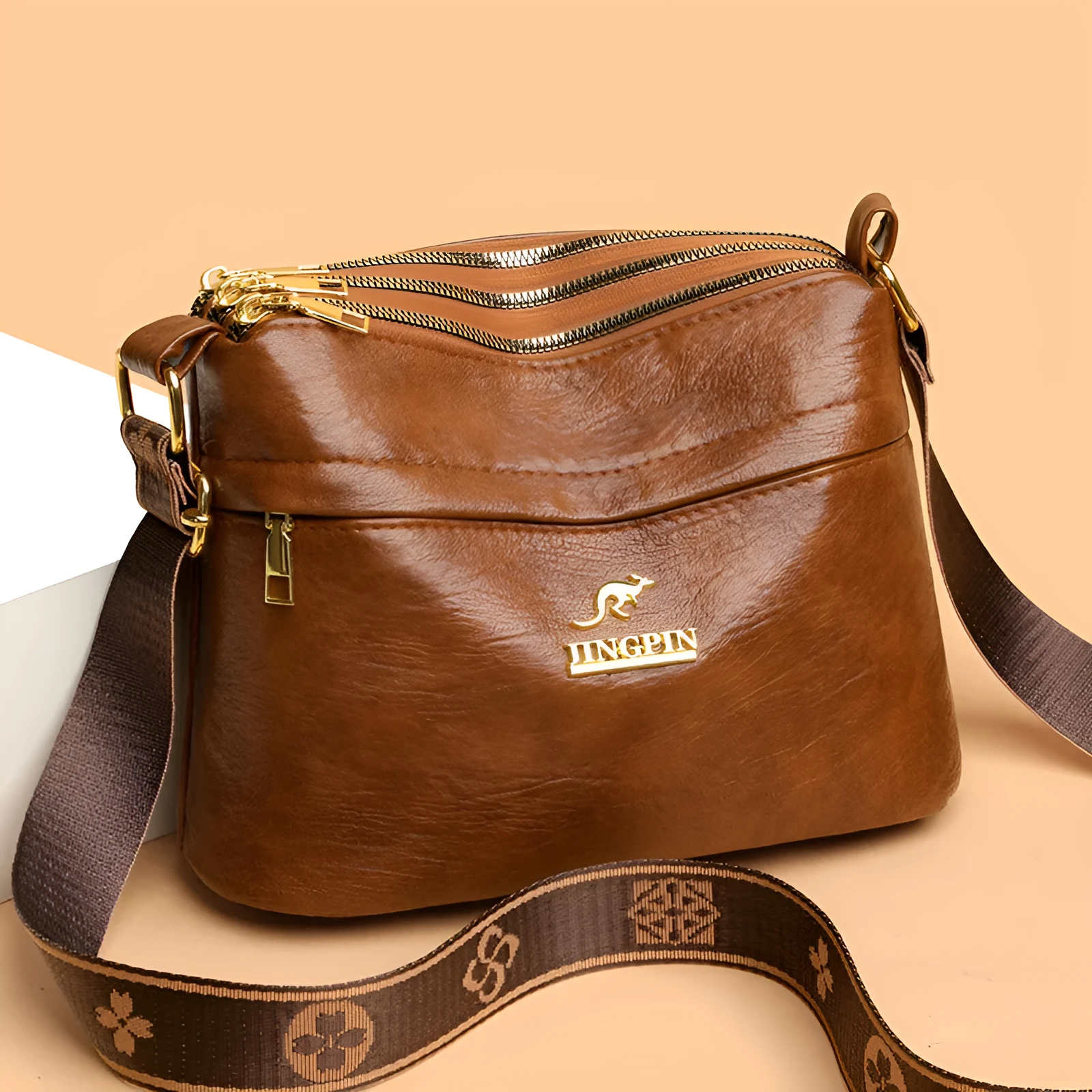 Brown PU messenger bag with multiple compartments and cross body strap