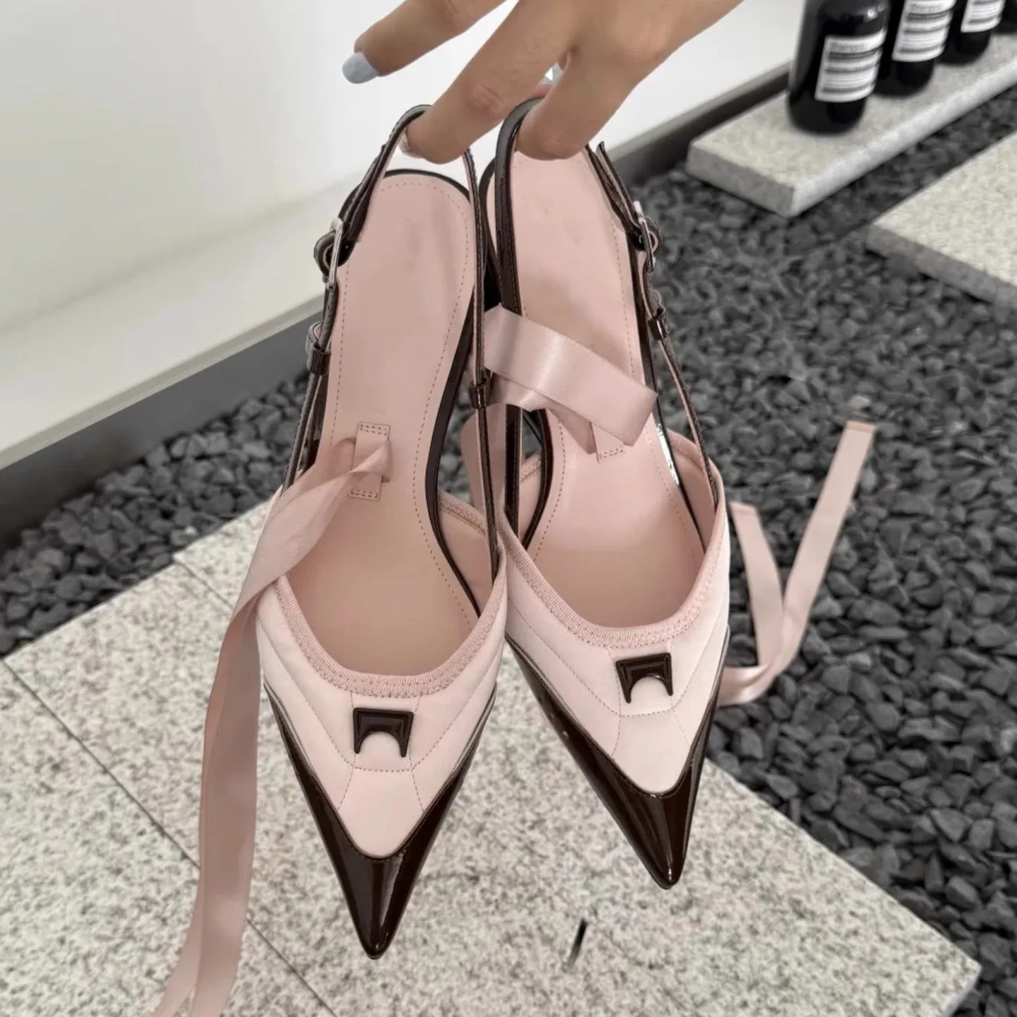 Women's black and pink lace-up high heels with a special-shaped heel root.