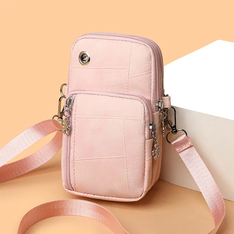 Brown PU leather vertical square mobile phone bag with crossbody strap and sandwich pocket.