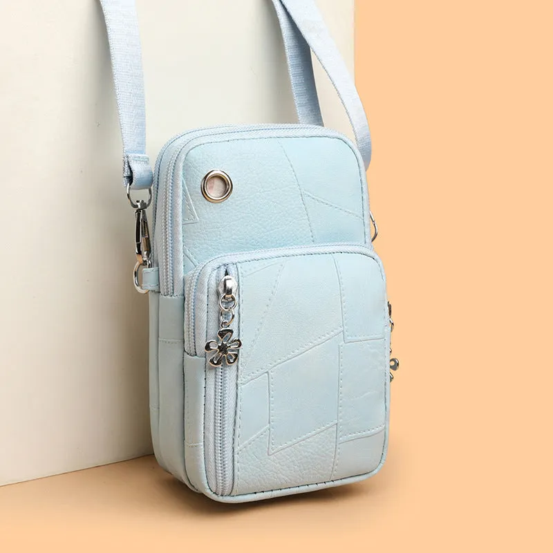 Brown PU leather vertical square mobile phone bag with crossbody strap and sandwich pocket.