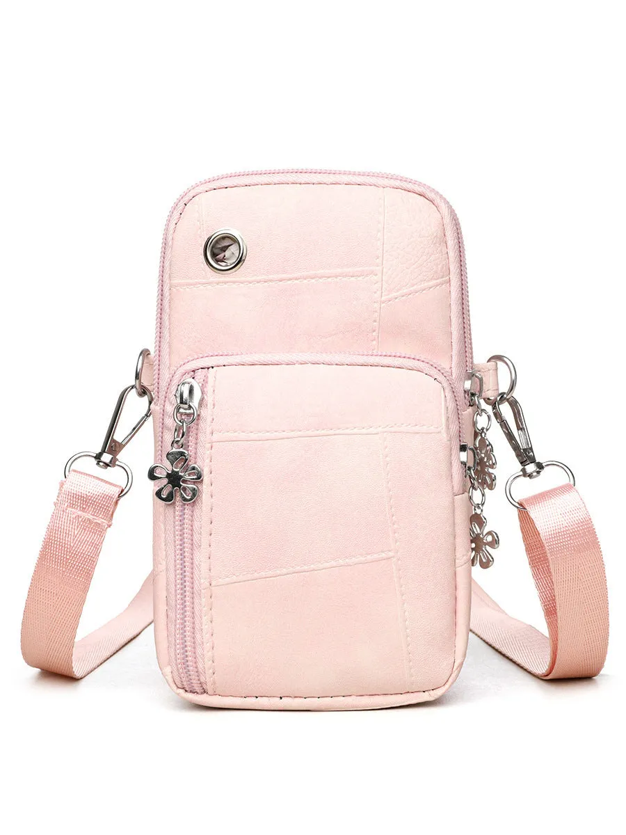 Brown PU leather vertical square mobile phone bag with crossbody strap and sandwich pocket.