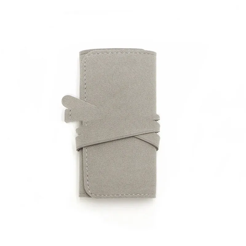Brown leather 12x12cm jewellery storage bag with zip for earrings and watches.