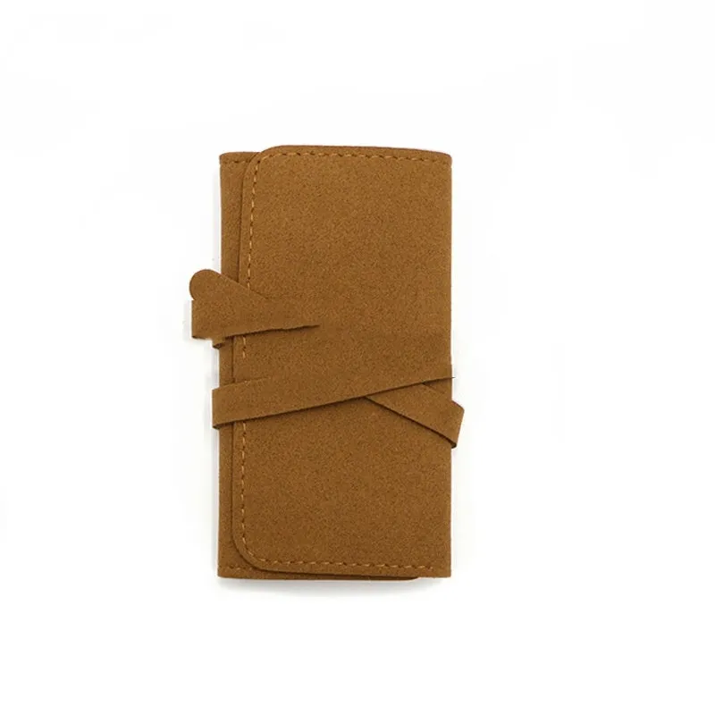 Brown leather 12x12cm jewellery storage bag with zip for earrings and watches.