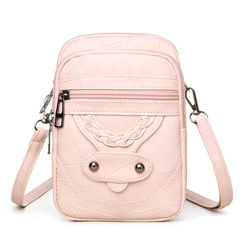 Soft brown PU leather vertical mobile phone bag with weaving pattern and metal rivets.