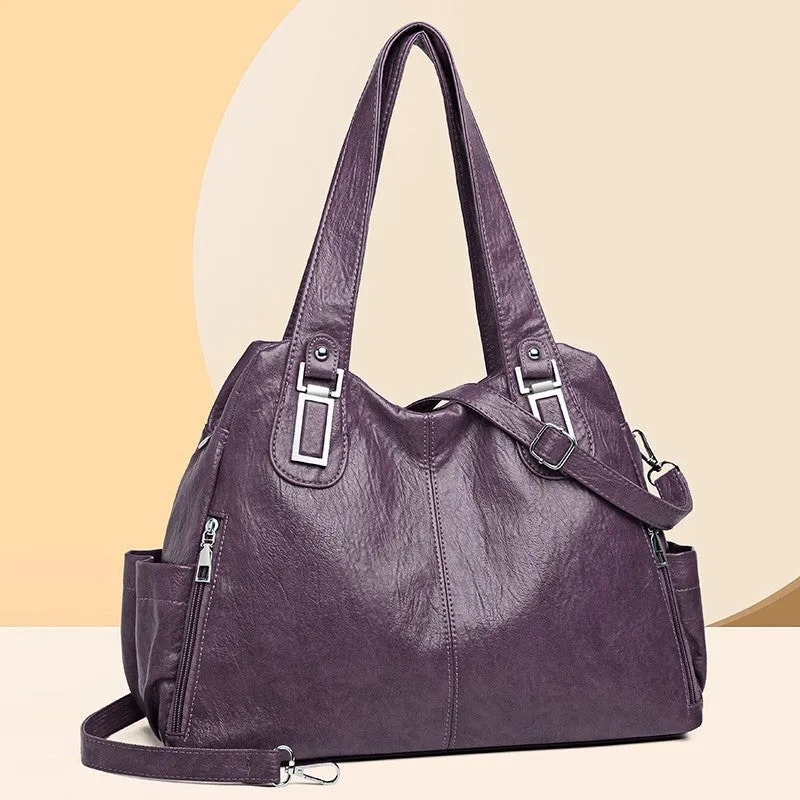 Soft PU square vertical tote bag with a single shoulder strap and internal zipper compartment.