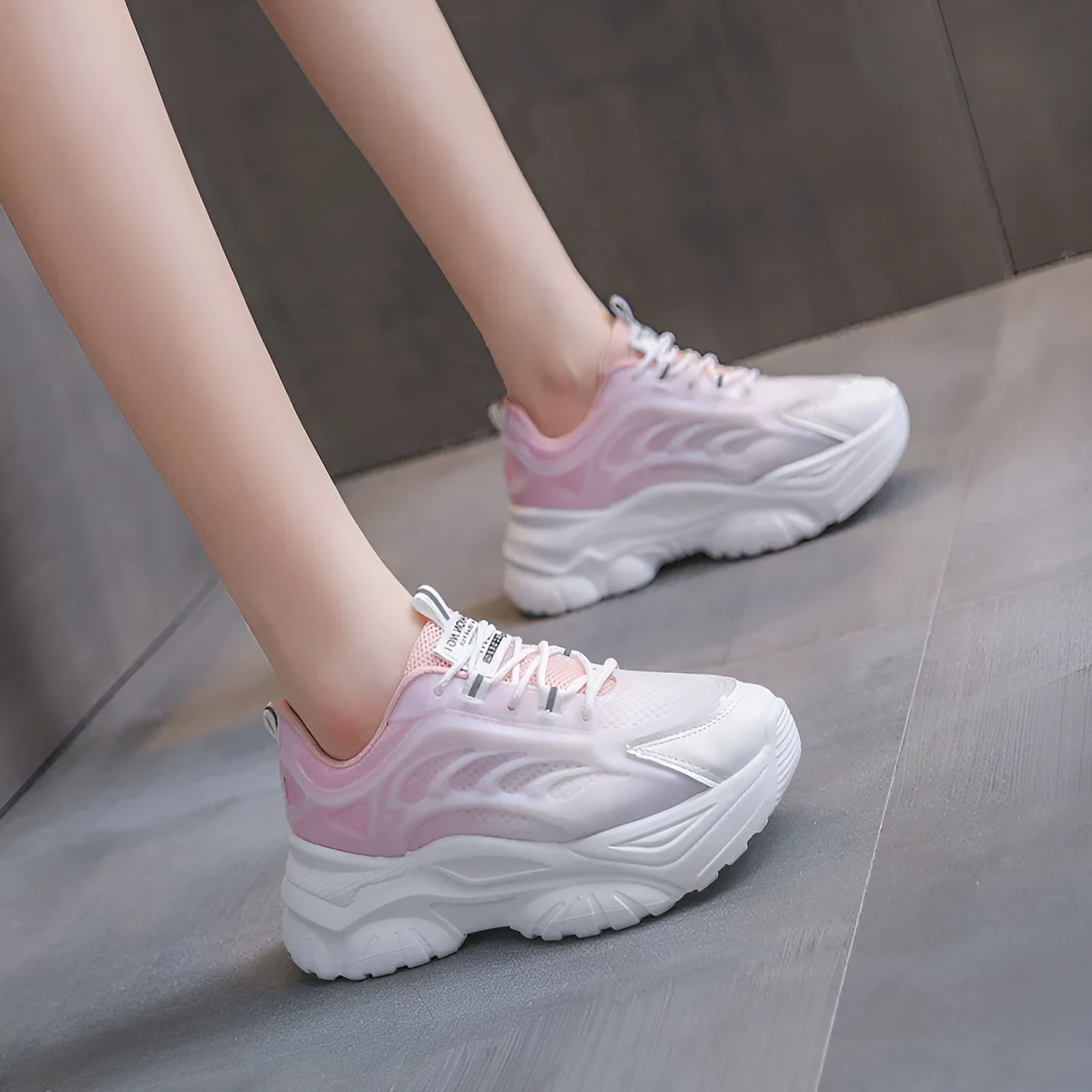 Women's casual shoes with satin upper in blue colour showing round toe and lace-up design