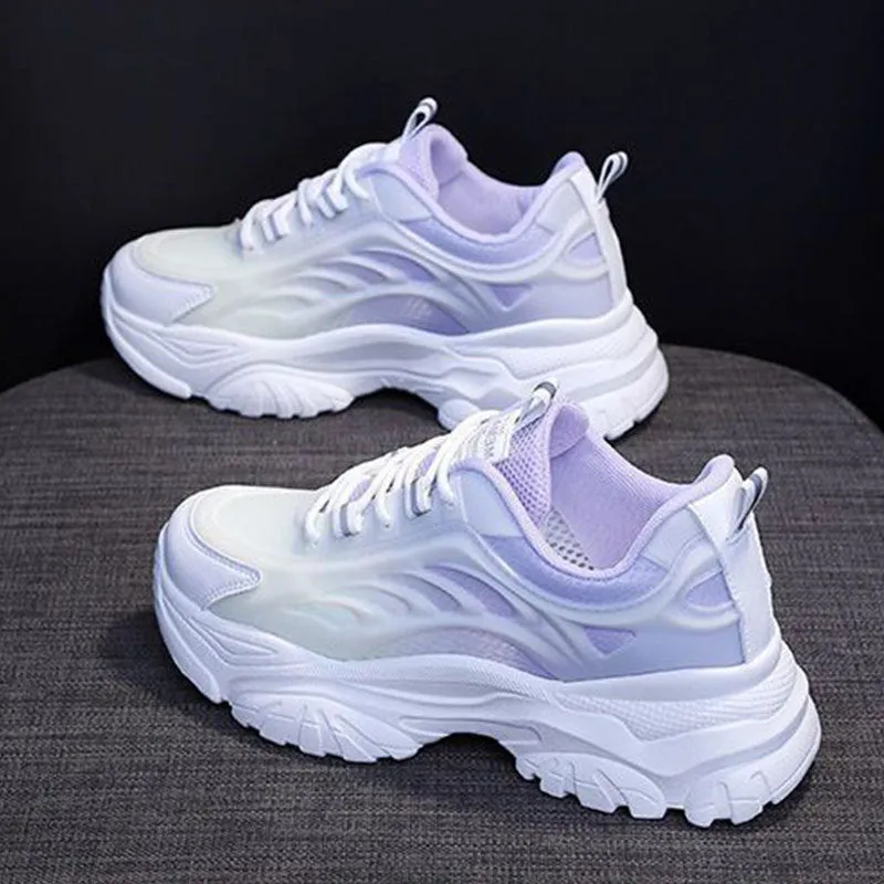Women's casual shoes with satin upper in blue colour showing round toe and lace-up design