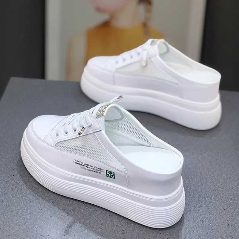 Women's white mesh platform sneakers with a round toe and rubber sole.