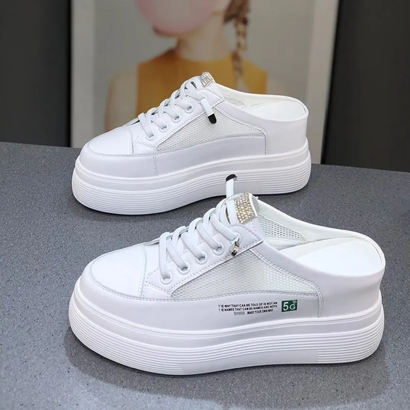 Women's white mesh platform sneakers with a round toe and rubber sole.