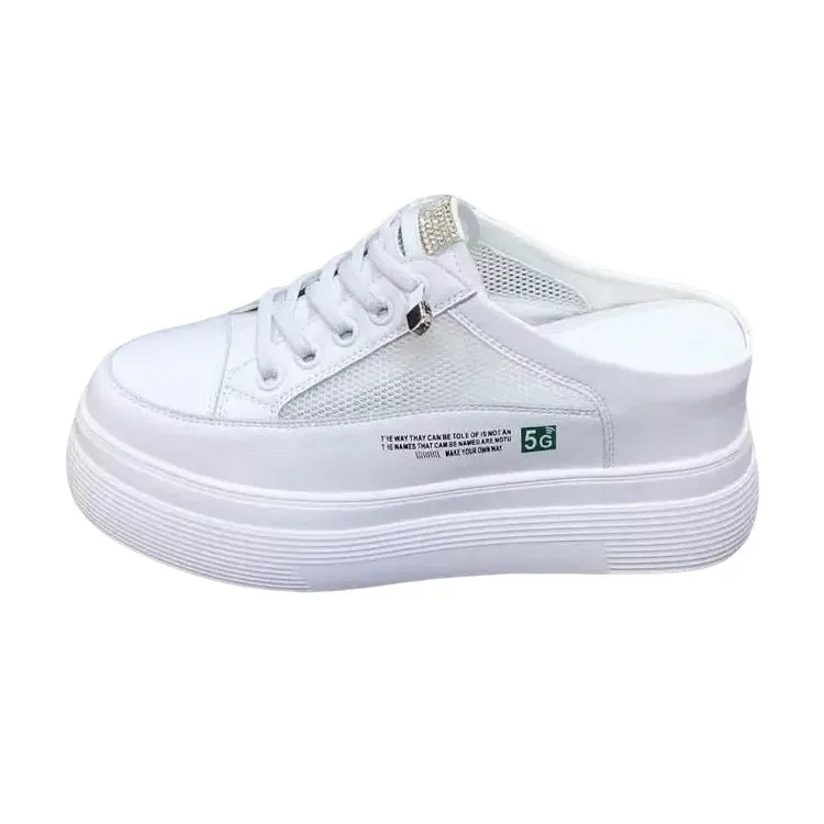 Women's white mesh platform sneakers with a round toe and rubber sole.