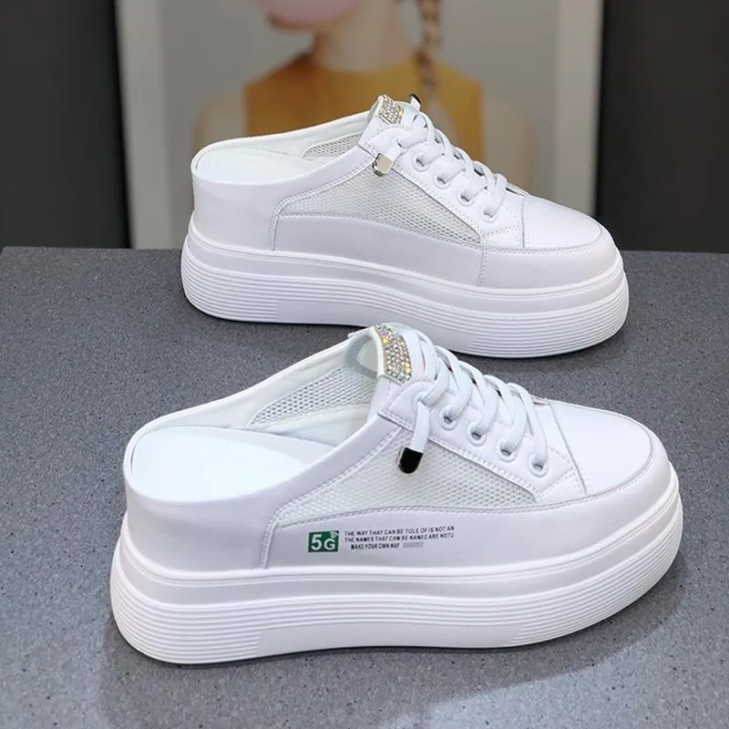 Women's white mesh platform sneakers with a round toe and rubber sole.