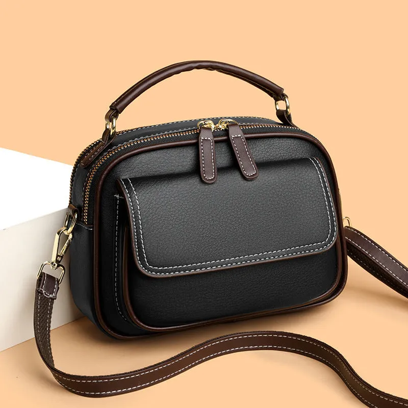 Women's black PU cross-body shoulder bag with square shape and adjustable double straps