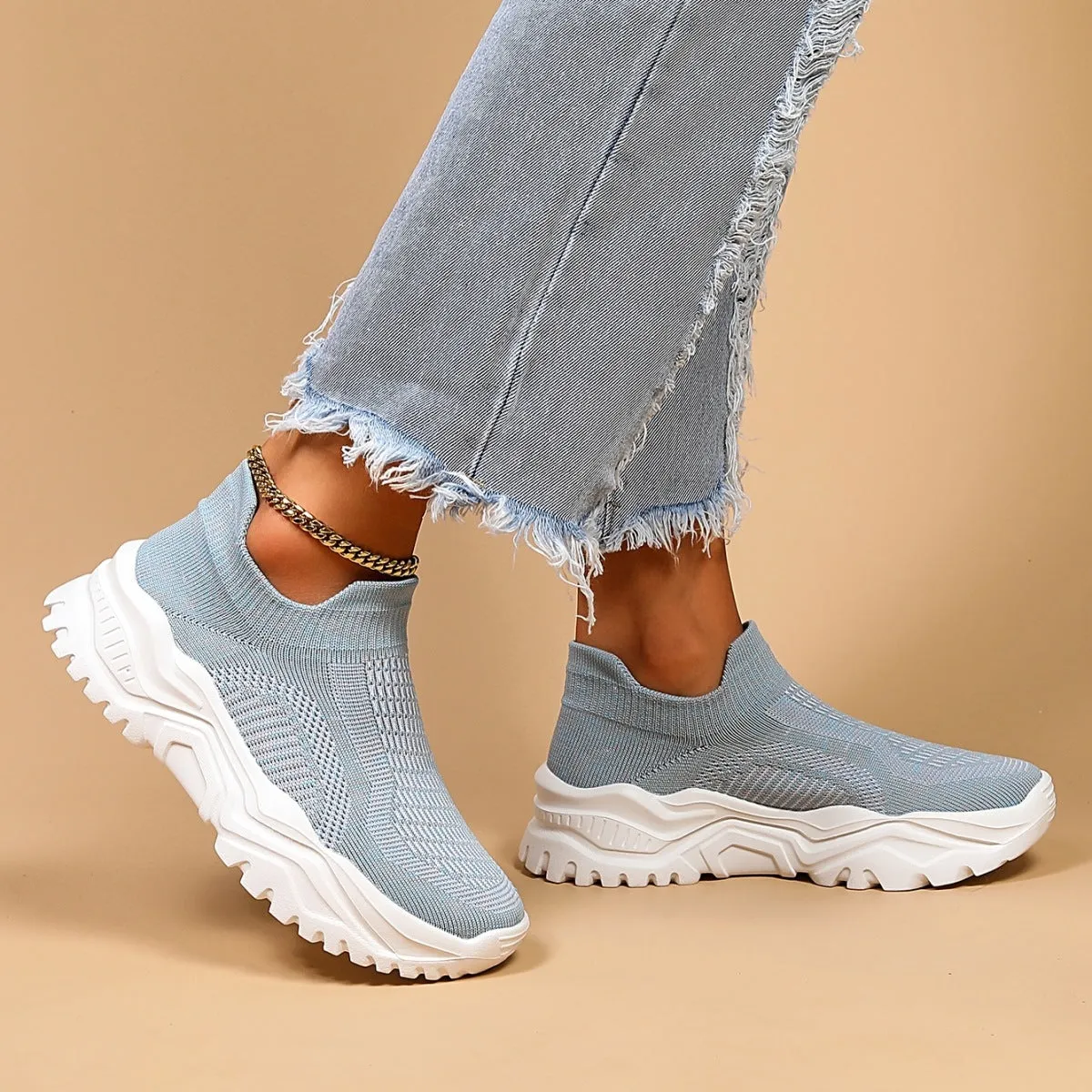 Light blue women's mesh slip-on sports shoes with round toe and mid heel