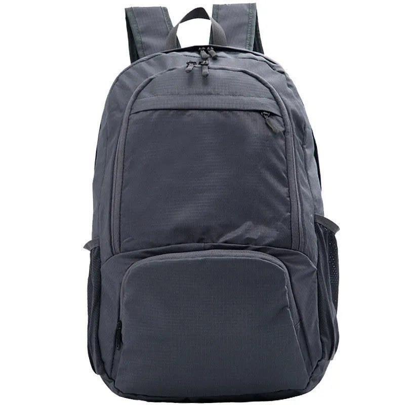 26-inch foldable Oxford cloth backpack shown in brick red colour, laying flat.