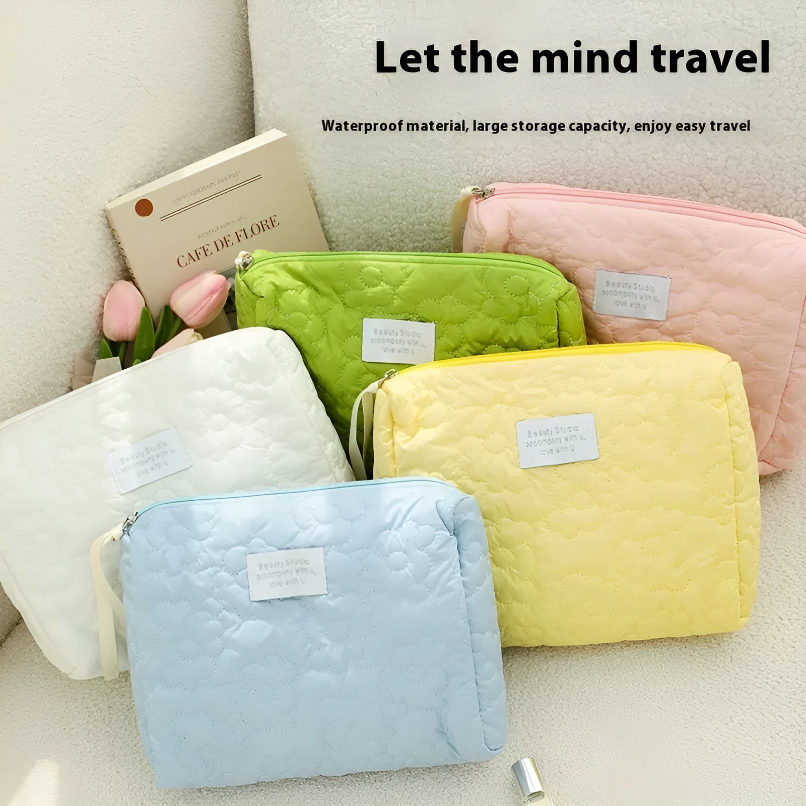 Quilted silk cosmetic bag in candy colours showing pink, yellow, blue, white, and green options