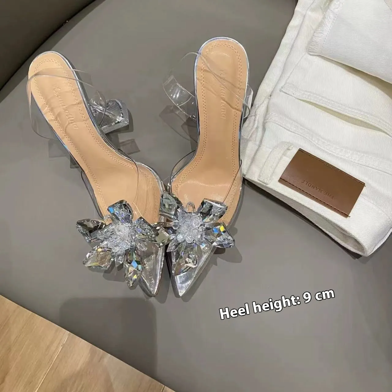 Women's high heels with transparent crystal flower decoration and pointed toe in microfiber